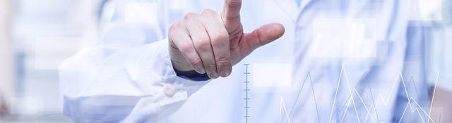 Man touching an interactive computer screen. 